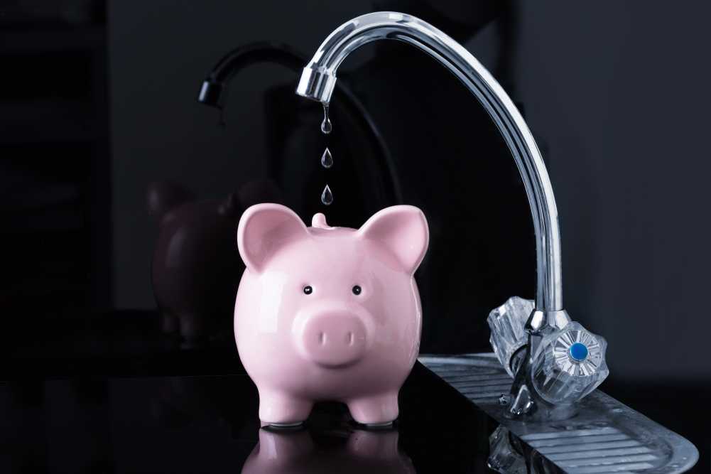 Piggy-Bank and dripping faucet